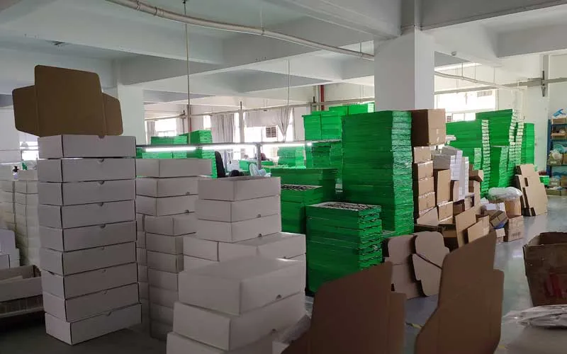 Glasses pile in packing workshop